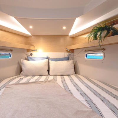 Cozy and stylish guest cabin, perfect for relaxing after a day of sailing 